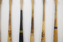 Suicide Squeeze – 20 game used broken MLB baseball bats displayed on wall