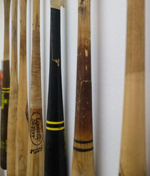 Suicide Squeeze – cracked black bat detail